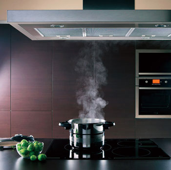Kitchen Cabinets Sacramento in upscale hood and stainless steel pot of boiling water vapor being